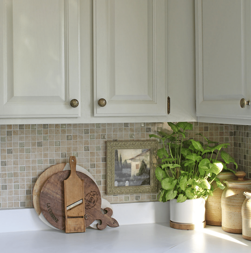 Kitchen showing vale mist cabinets and backsplash