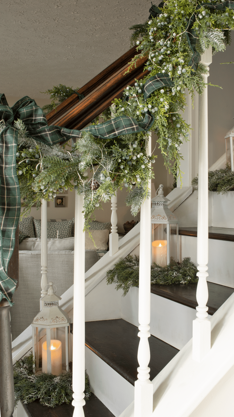 A stairwell with garland and lanterns on the steps