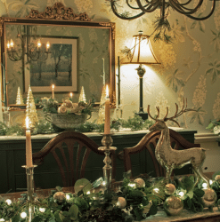 A tablescape and sideboard in candlelight in a grandmillenial style dining room