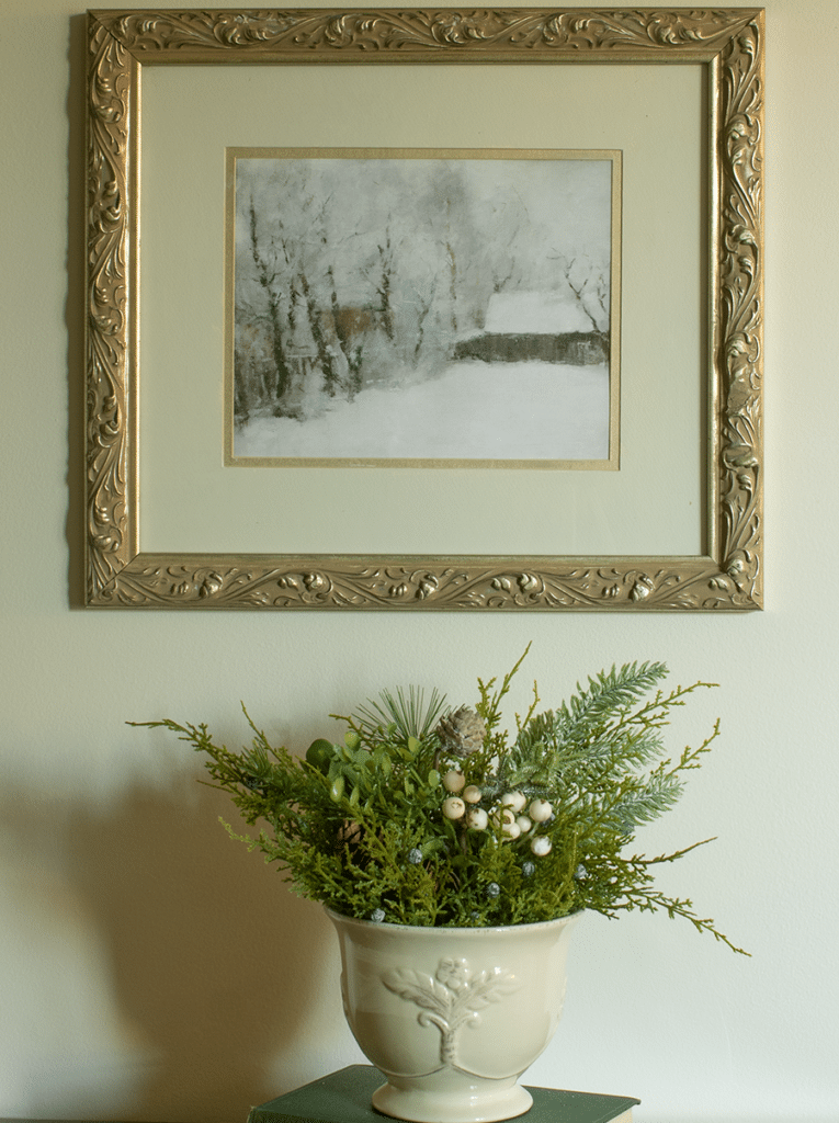 Cozy winter art above a bowl of greens