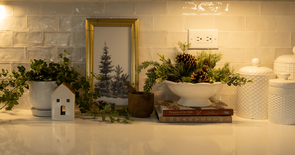 A kitchen counter with winter decor