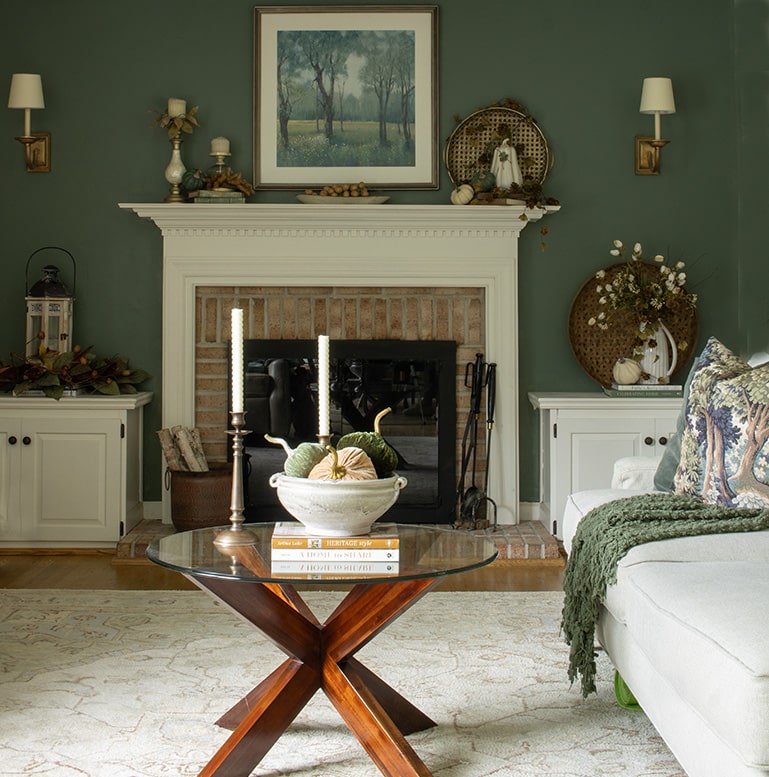 A room that shows ideas for decorating for fall in shades of green and brown