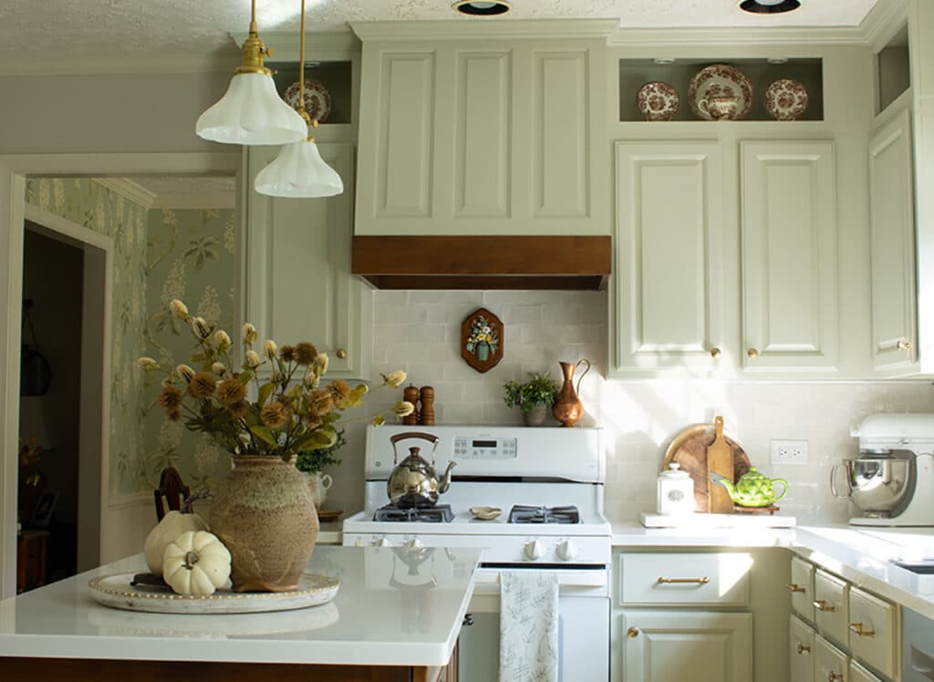 A kitchen island decorated for fall