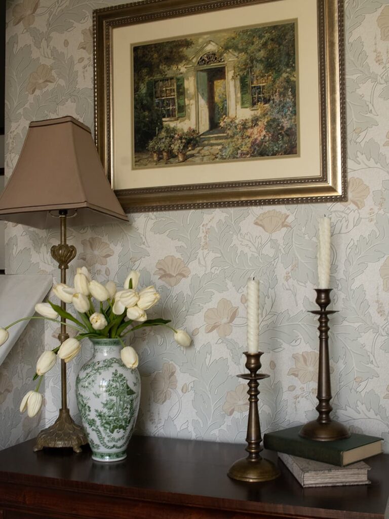 White faux tulips styled in a green chinoiserie vase.