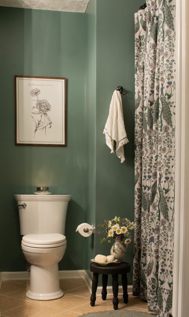 A bathroom showing a diy shower curtain