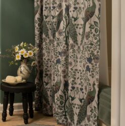 A DIY shower curtain styled with a stool and fresh flowers